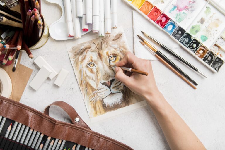 flat-lay-art-desk-concept-with-drawing